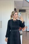 GÜLÜMSER ELBİSE